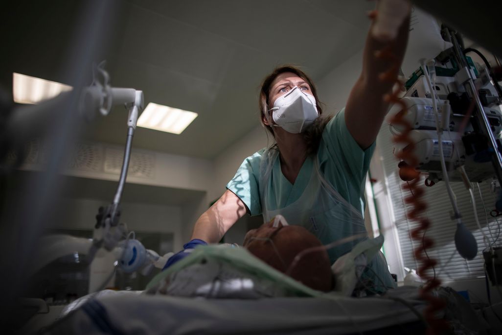A healthcare worker takes care of a post-covid patient in the ICU ward at Hospital Karvina-Raj on January 11, 2020 in Karvina, Czech Republic.