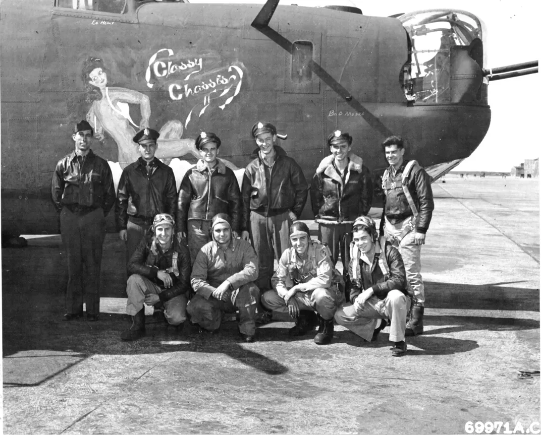 Members of the 849th Bombardment Squadron pose with the Classy Chassis II ​​​​​​​in March 1944