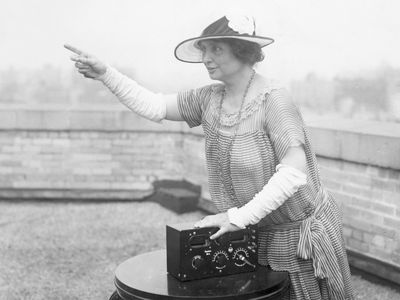 Helen Keller in a photograph taken to promote her efforts to give radios to poor blind children.
