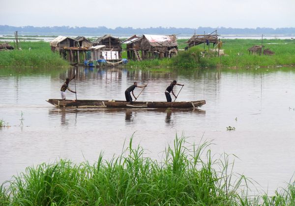 Three Men In Canoe on the Congo River thumbnail