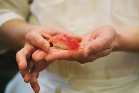 A chef preparing sushi.