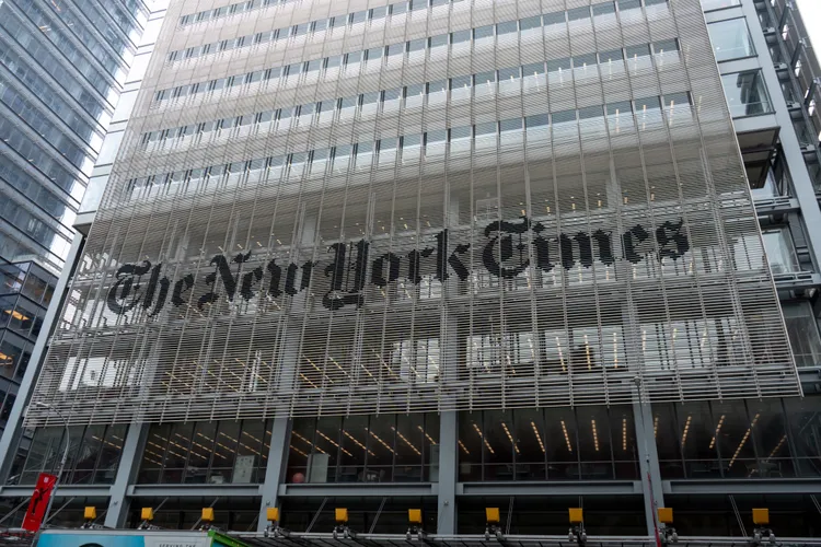 The New York Times building, with its newspaper logo sign above the entrance, seen in New York City on August 6, 2026