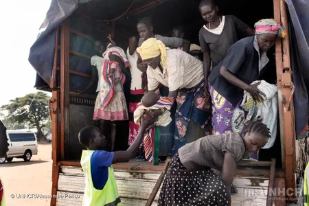South Sudanese refugees arrive at Suluba Transit Centre, where they will be registered, health checked and given medical treatment.