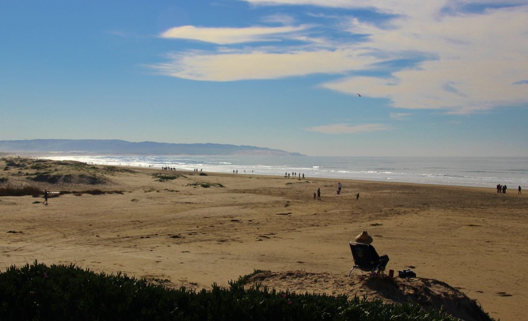 A man was people watching at Grover Beach, Calif | Smithsonian Photo ...