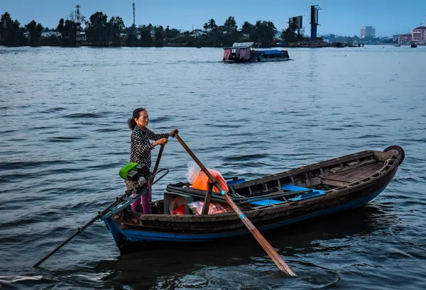 Vietnamese woman looking to pick up a fare thumbnail