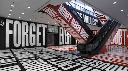 The artist’s black, white and red phrases titled Belief+Doubt exist outside the traditional galleries.