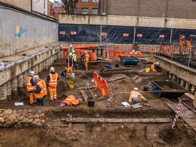 Archaeologists unearth a limestone foundation of one of the buildings of St. Mary&#39;s College - an Oxford College left to decay 500 years ago as result of Henry VIII&#39;s dissolution of the monasteries.