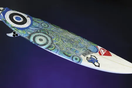 This custom-made board carried Kelly Slater to victory in Australia in 2010; the champion got his first surfboard at age 8 and from that moment, he says, “I was hooked.”