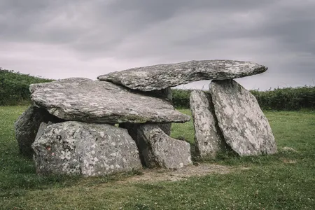 Bronze Age wedge tombs like the one pictured here are found throughout southwest Ireland. But the newly discovered burial “seems to be different,” archaeologist Mícheál Ó Coileáin tells the Irish Times. “Wedge tombs are usually visible above ground, [but] this one is completely concealed.”
