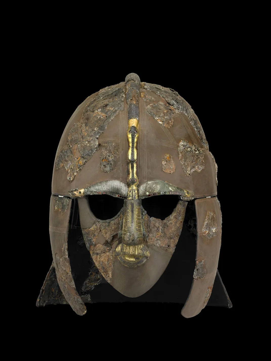 Metal helmet against black backdground