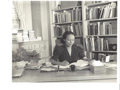 Dorothy Porter in 1939, at her desk in the Carnegie Library at Howard University. 