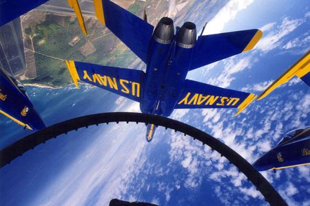 The U.S. Navy’s premiere Flight Demonstration Team, the “Blue Angels”, are stationed at Naval Air Station Pensacola, Florida, and fly the McDonnell-Douglas F/A-18 “Hornet” strike fighter.