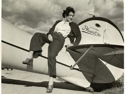 Aline Rhonie with her Luscombe Phantom. She told the New York "Mirror" in 1940: "I hit a man once. Socked him in the nose...and it bled. He said that women weren't good for anything but having babies...."