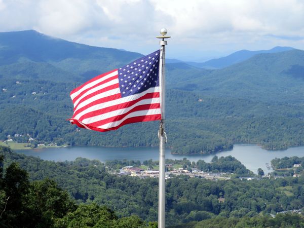 American Flag flying high in the Mountains thumbnail