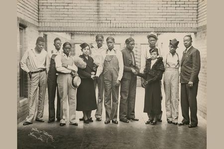 This 1936 photograph from the collections of the National Portrait Gallery—featuring eight of the nine Scottsboro Boys with NAACP representatives Juanita Jackson Mitchell, Laura Kellum, and Dr. Ernest W. Taggart—was taken inside the prison where the Scottsboro Boys were being held. 