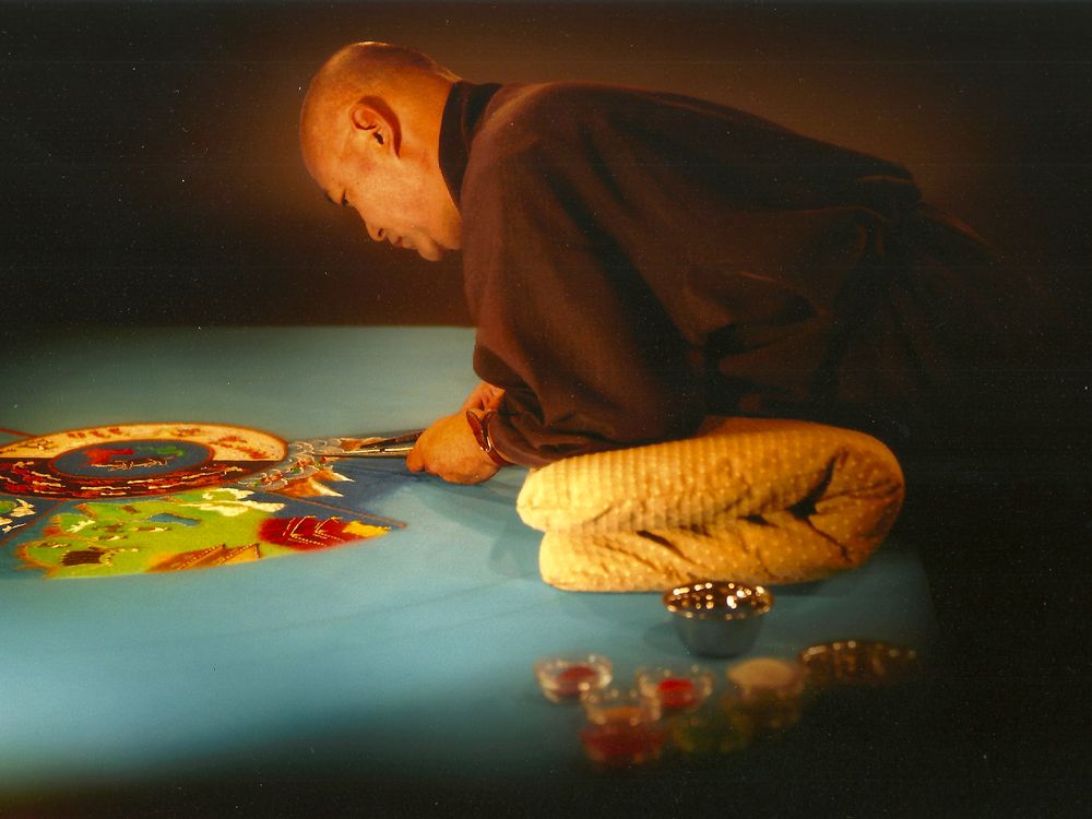 Losang Samten makes a sand mandala