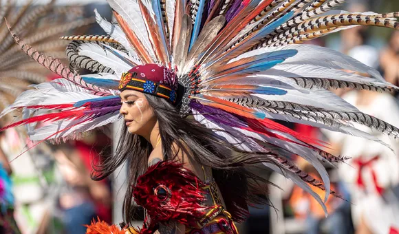 Female Aztec dancer in motion.