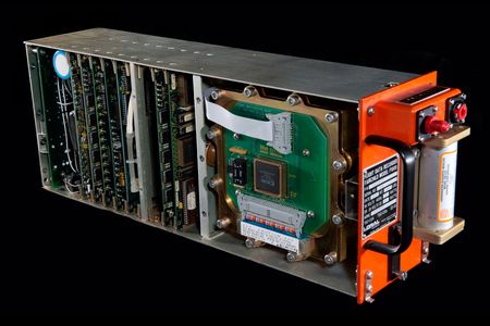 A modern flight data recorder, a.k.a. a "black box." Despite the name, these recorders are typically painted orange.