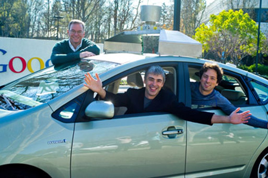 Google founders Eric Schmidt, Sergey Brin and Larry Page in their company's driverless car