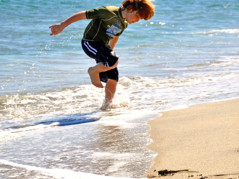 My stepson having a wonderfully fun and free time at the beach in S FL ...