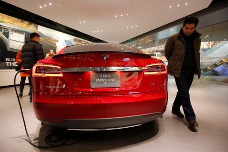 Electric vehicles, such as the ones sold by Tesla, could help to reduce city temperatures.