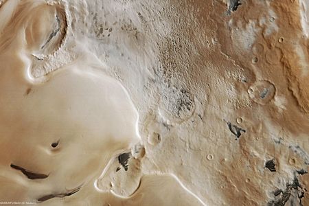 There’s no lack of ice and snow near the Martian south pole, where it can be 3,500 meters thick. 