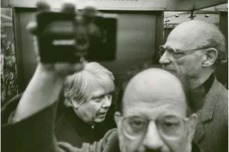 Allen Ginsberg photographs himself, Arthur Miller and William H. Gass in an elevator in Copenhagen&#39;s Hotel Royal.