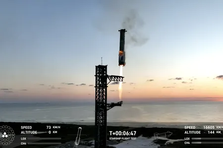The Super Heavy booster returning to the launch tower.