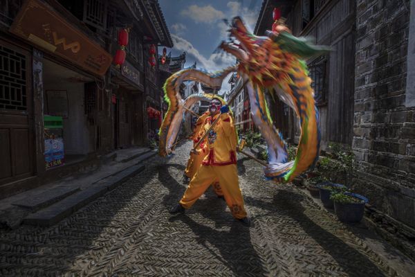 Dragon dance parade in street thumbnail