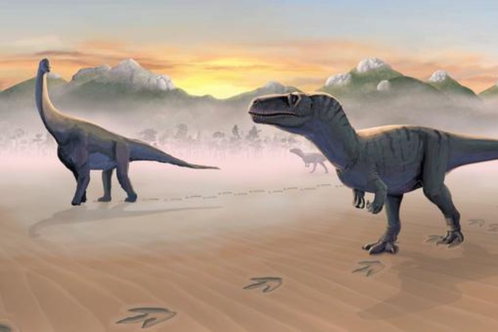 A rendering of dinosaurs walking across a sandy landscape