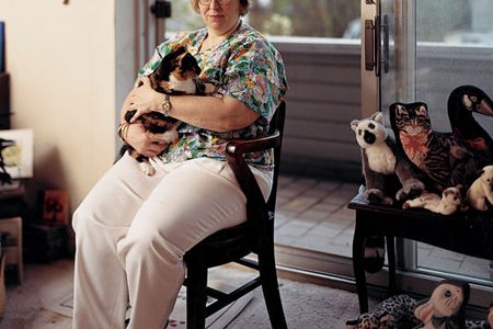 "I had a bunch of birds that had died of encephalitis at the same time people had encephalitis," says Tracey McNamara (in her Bronx apartment), a veterinary pathologist formerly at the Bronx Zoo. She helped link the virus to the 1999 epidemic.