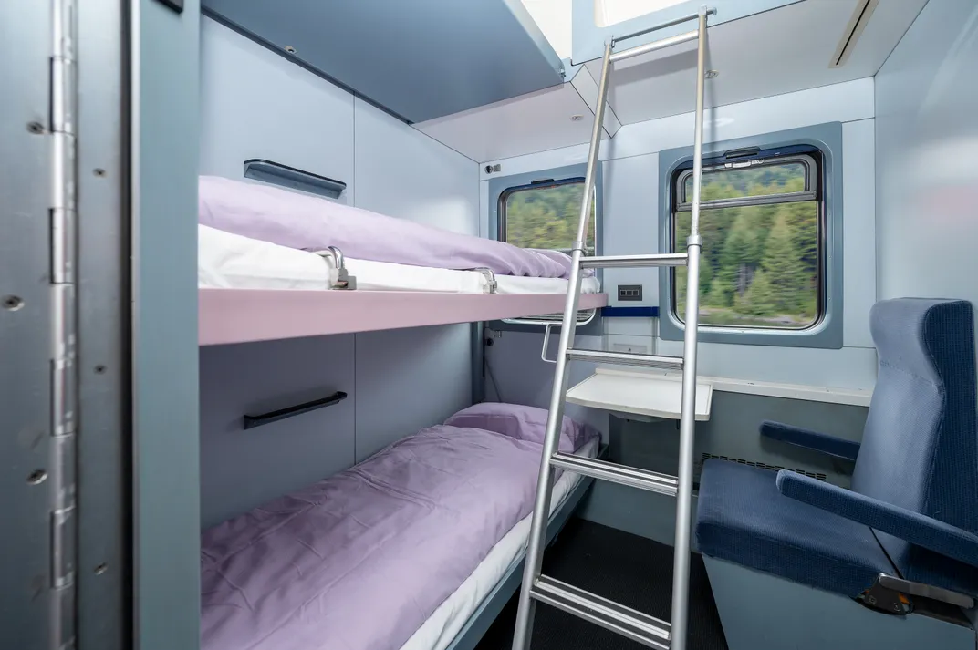 Two bunk beds on train car