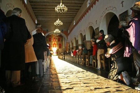 The 2007 midwinter solstice illumination of the main altar tabernacle of Old Mission San Juan Bautista, California.