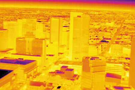 Phoenix glows even after 10 p.m. one April night in this image made with a camera sensitive to infrared light, which is generated by heat and invisible to the naked eye. Researchers call the city an “urban heat island.” 