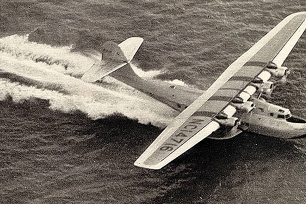 The China Clipper "scudded along a considerable sea swell" before vaulting into the air, reported Leo Kieran.