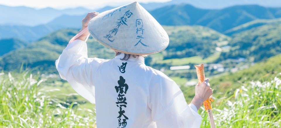  Pilgrim in traditional dress along the Shikoku Pilgrimage Trail 