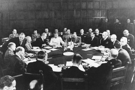 A conference session including Clement Attlee, Ernest Bevin, Vyacheslav Mikhailovich Molotov, Joseph Stalin, William D. Leahy, Joseph E. Davies, James F. Byrnes, and Harry S. Truman.