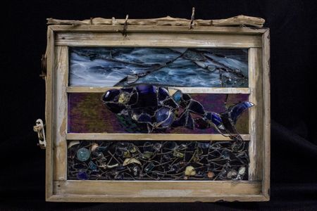 Donna Mahan's "Safeguarding" was made with a castoff window from the residence. 