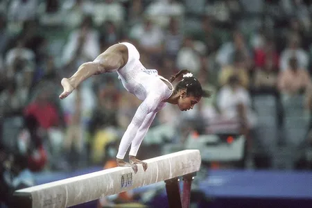 Gymnast Dominique Dawes competes on the balance beam during the 1992 Summer Olympics in Barcelona.