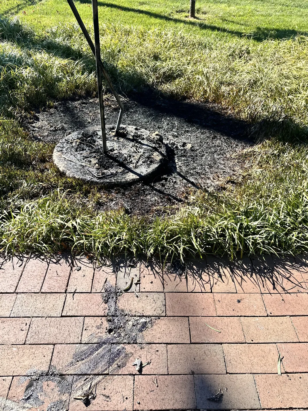 A charred black spot on the ground