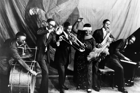 Ma Rainey poses with her band for a studio group shot c. 1924-25.