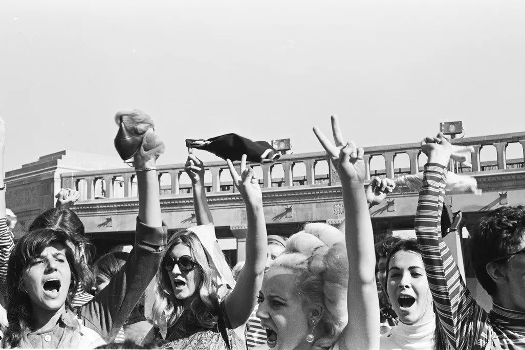 Women gleefully threw objects