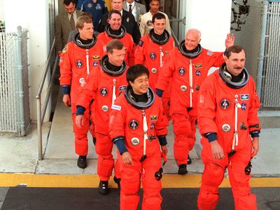 Glenn preparing to board Discovery in 1998