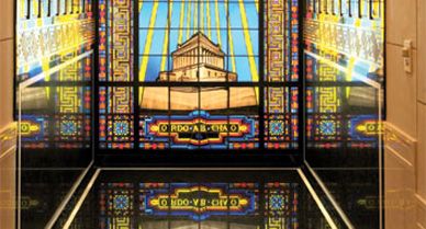 Conspiracists try to decode Masonic symbols, like those in the temple's stained-glass window.