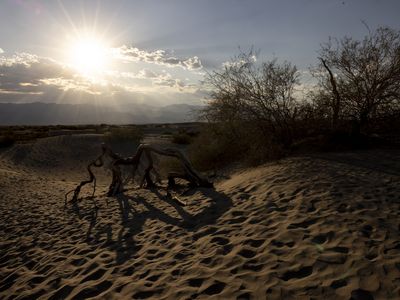 The sun sets over Death Valley, California, on July 7, 2024, a day when its temperature reached 129 degrees Fahrenheit.