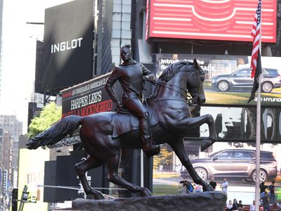 The sculpture “Rumors of War” is unveiled in Times Square on September 27, 2019 in New York City.