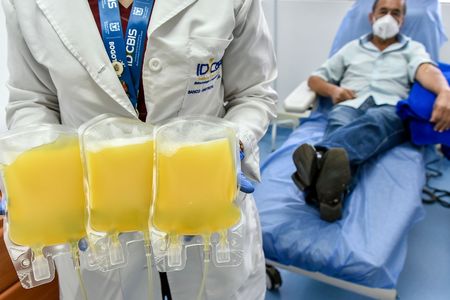 A man who recovered from COVID-19 donates plasma in Bogota, Colombia.