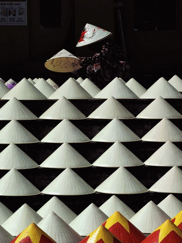 Crafting Light and Shadow in a Vietnamese Hat Workshop thumbnail