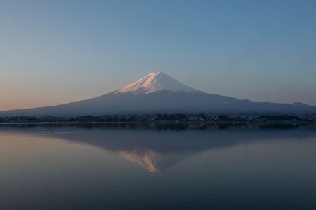 Eternally mysterious Mount Fuji, as seen from Lake 
Kawaguchiko, remains a powerful force in Japanese culture and a must-do hike for truth-seekers despite the crowds and the looming threat of eruption.