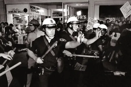 Oakland police use Mace during Oakland's "Stop the Draft Week" October 16, 1967, the largest anti-Vietnam war protest in the San Francisco bay area to that date, in downtown Oakland.